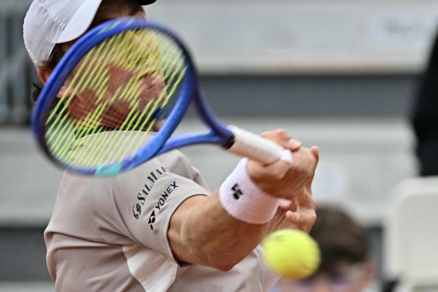 Norway's Casper Ruud hits a return to Czech Republic's Jiri Lehecka during the ATP Rome Open tennis tournament at Foro Italico in Rome on May 10, 2026. (Photo by Filippo MONTEFORTE / AFP)