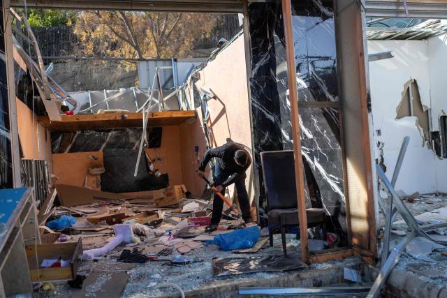 Palestinian worker uses a sledge hammer as he has demolishes his shop, ahead of the arrival of an Israeli army demolition team, in the Israeli-occupied Palestinian West Bank town of al-Eizariya, bordering East Jerusalem on May 10, 2026. Israel has a policy of demolishing the homes of Palestinians accused of deadly attacks against Israelis, saying it acts as a deterrent, as well as structures that Israel says are built without a licence. (Photo by ilia YEFIMOVICH / AFP)