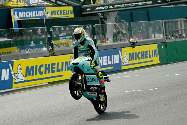 Leopard Racing's Spanish rider Adrian Fernandez celebrates as he crosses the finish line to take second place in the Moto3 race as part of the Moto GP Grand Prix of France weekend at Le Mans, northwestern France, on May 10, 2026. (Photo by Loic VENANCE / AFP)