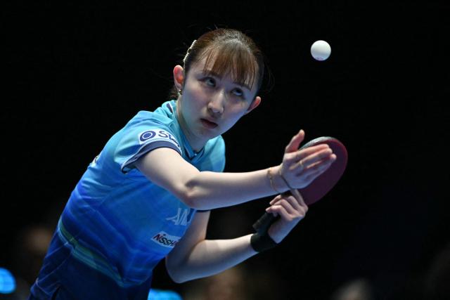 Japan's Hina Hayata serves against China's Sun Yingsha during their Women's Teams final match at the ITTF World Table Tennis Championships in Wembley Arena, west London on May 10, 2026. (Photo by Glyn KIRK / AFP)