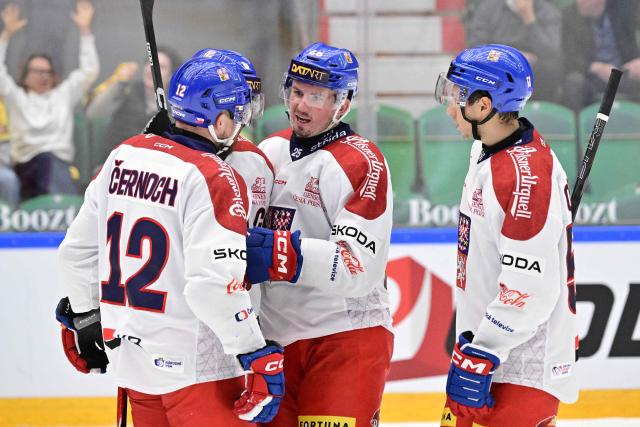 Czechia's Jan Mandat (C, 25) celebrates with teammates after scoring during the ice hockey Euro Hockey Tour (EHT) Beijer Hockey Games match between Switzerland and Czechia at Catena Arena in Angelholm, Sweden, on May 10, 2026. (Photo by Johan Nilsson/TT / TT News Agency / AFP) / Sweden OUT