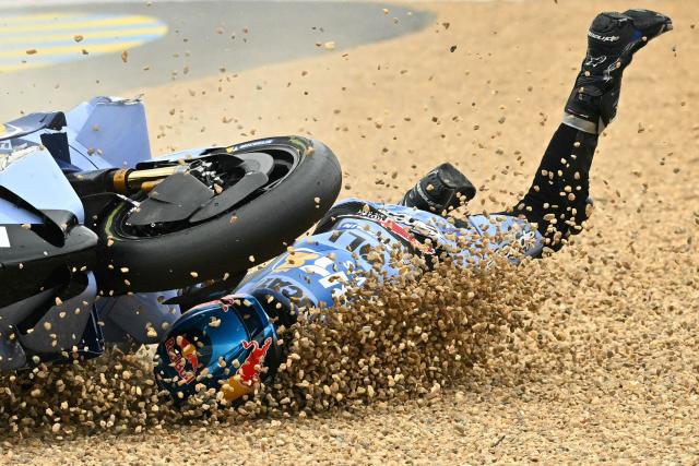 BK8 Gresini Racing MotoGP's Spanish rider Alex Marquez crashes out of the Moto GP Grand Prix of France at Le Mans, northwestern France, on May 10, 2026. (Photo by Loic VENANCE / AFP)