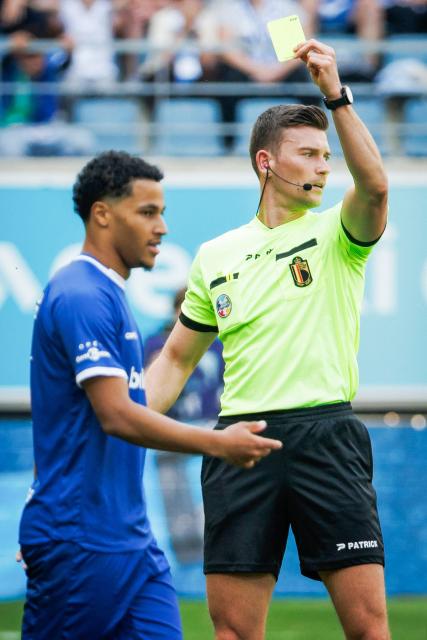 KAA Gent's Swedish forward #11 Momodou Lamin Sonko receives a yellow card from Belgian referee Wesli De Cremer during the Belgian "Pro League" First Division play-off football match between KAA Gent and RSC Anderlecht at the KAA Stadium in Ghent, northwestern Belgium on May 10, 2026. (Photo by KURT DESPLENTER / BELGA / AFP) / Belgium OUT