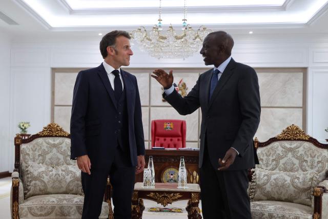 French President Emmanuel Macron (L) and Kenyan President William Ruto (R) speak to each other during a reception at State House ahead of the Africa Forward: Africa- France Partnerships for Innovation and Growth Summit in Nairobi on May 10, 2026. Kenya and France will jointly host the “Africa Forward: Africa- France Partnerships for Innovation and Growth” Summit, which will bring together African and French Heads of State and Government. (Photo by Ludovic MARIN / AFP)