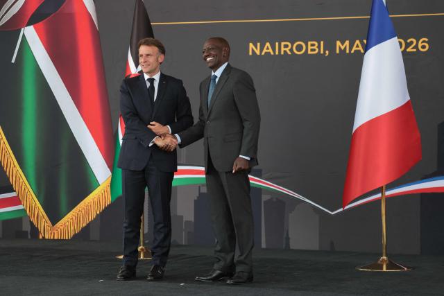France's President Emmanuel Macron (L) shakes hands with Kenya's President William Ruto (R) ahead of the Africa Forward: Africa- France Partnerships for Innovation and Growth Summit in Nairobi, on May 10, 2026. Kenya and France will jointly host the “Africa Forward: Africa- France Partnerships for Innovation and Growth” Summit, which will bring together African and French Heads of State and Government. (Photo by Ludovic MARIN / AFP)