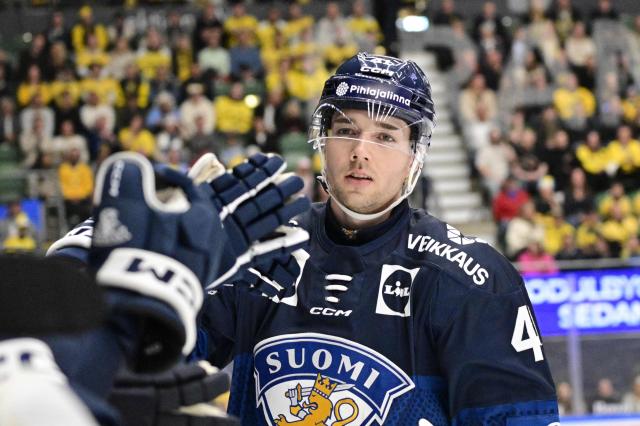 Finland's Ville Heinola (41) celebrates scoring the opening goal during the ice hockey Euro Hockey Tour (EHT) Beijer Hockey Games match between Sweden and Finland at Catena Arena in Angelholm, Sweden, on May 10, 2026. (Photo by Johan Nilsson/TT / TT News Agency / AFP) / Sweden OUT