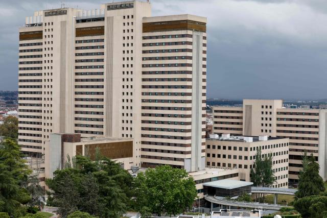 A general view shows Gomez Ulla Defense Hospital where the Spanish passengers evacuated from the Dutch flagged hantavirus-stricken cruise ship MV Hondius were due to arrive in Madrid. on May 10, 2026. Repatriation flights for the nearly 150 passengers onboard the ship hit by a deadly hantavirus outbreak got underway as passengers and some crew members were transferred to shore on smaller vessels then by bus to the airport and then flown home after weeks at sea. (Photo by Oscar DEL POZO / AFP)