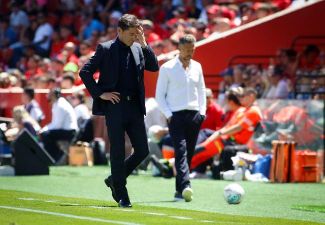 Villarreal's Spanish coach Marcelino Garcia Toral (L) and Real Mallorca's Argentine coach Martin Demichelis gesture during the Spanish league football match between RCD Mallorca and Villarreal CF at Mallorca Son Moix Stadium in Palma de Mallorca on May 10, 2026. (Photo by JAIME REINA / AFP)