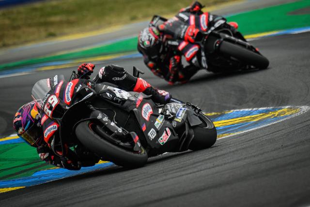 Aprilia Racing's Spanish rider Jorge Martin (L) corners as he leads the Moto GP Grand Prix of France at Le Mans, northwestern France, on May 10, 2026. (Photo by Loic VENANCE / AFP)