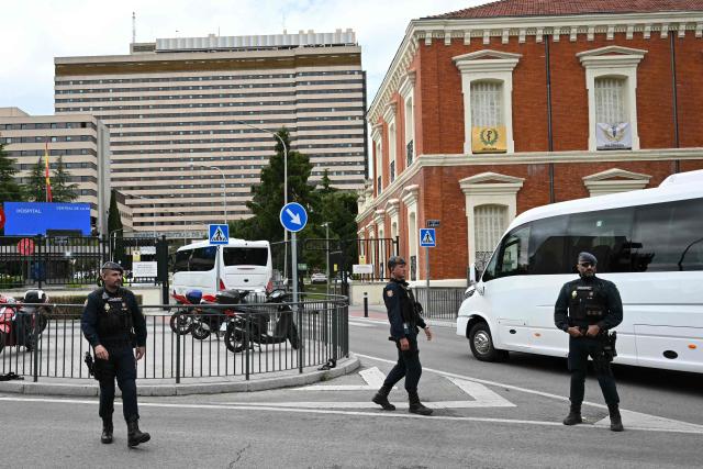 The convoy of Spanish passengers that were evacuated from the Dutch flagged hantavirus-stricken cruise ship MV Hondius arrives to the Gomez Ulla Defense Hospital in Madrid. on May 10, 2026. Repatriation flights for the nearly 150 passengers onboard the ship hit by a deadly hantavirus outbreak got underway as passengers and some crew members were transferred to shore on smaller vessels then by bus to the airport and then flown home after weeks at sea. (Photo by Javier SORIANO / AFP)