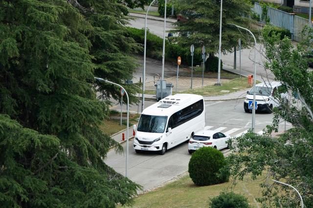The convoy of Spanish passengers that were evacuated from the Dutch flagged hantavirus-stricken cruise ship MV Hondius arrives to the Gomez Ulla Defense Hospital in Madrid. on May 10, 2026. Repatriation flights for the nearly 150 passengers onboard the ship hit by a deadly hantavirus outbreak got underway as passengers and some crew members were transferred to shore on smaller vessels then by bus to the airport and then flown home after weeks at sea. (Photo by Oscar DEL POZO / AFP)