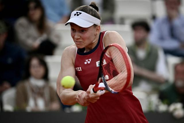 Kazakhstan's Elena Rybakina hits a return to Philippine's Alexandra Eala during their women's singles match at the WTA Rome Open tennis tournament at Foro Italico in Rome on May 10, 2026. (Photo by Filippo MONTEFORTE / AFP)
