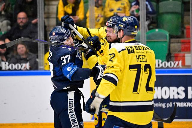 Finland's Eemil Erholtz (L) and Sweden's Robert Hägg (2nd R) fight during the ice hockey Euro Hockey Tour (EHT) Beijer Hockey Games match between Sweden and Finland at Catena Arena in Angelholm, Sweden, on May 10, 2026. (Photo by Johan Nilsson/TT / TT News Agency / AFP) / Sweden OUT