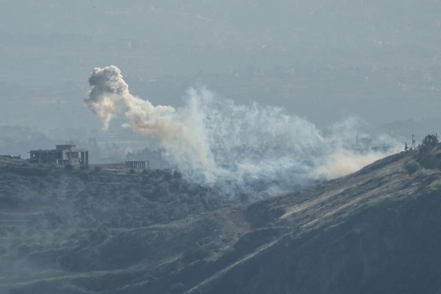 A photograph taken from the southern area of Marjayoun shows smoke rising during Israeli shelling targeting the outskirts of the village of Yohmor on May 10, 2026. Lebanon's health ministry said two paramedics from the Hezbollah-affiliated Islamic Health Committee were killed and five others wounded on May 10 in Israeli strikes on the country's south despite a ceasefire. (Photo by AFP)
