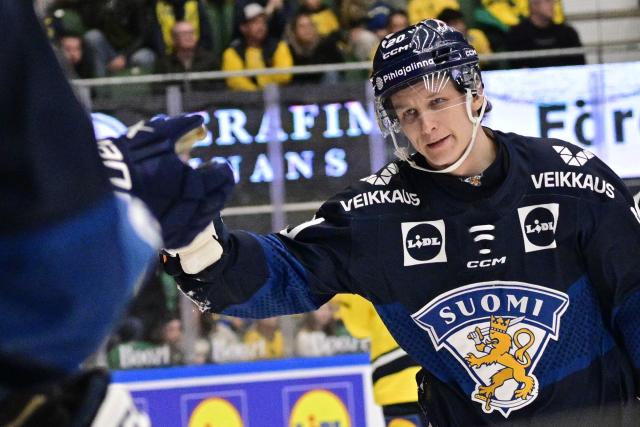 Finland's Patrik Puistola (20) reacts after scoring 1-2 during the ice hockey Euro Hockey Tour (EHT) Beijer Hockey Games match between Sweden and Finland at Catena Arena in Angelholm, Sweden, on May 10, 2026. (Photo by Johan Nilsson/TT / TT News Agency / AFP) / Sweden OUT