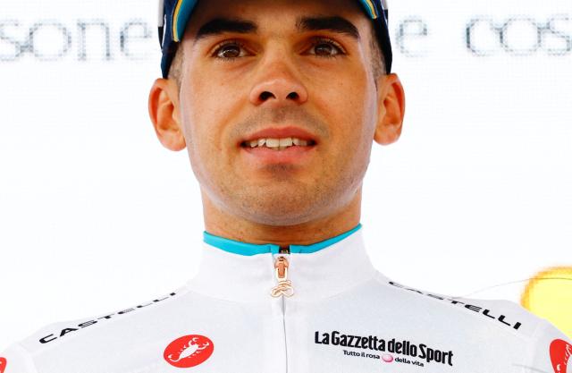 XDS Astana Team Uruguayan rider Guillermo Silva wearing the best young rider's white jersey (Maglia Bianca) celebrates on the podium after the 3nd stage of the Giro d'Italia 2026 - Tour of Italy cycling race between Plovdiv and Sofia, Bulgaria, on May 10, 2026.  (Photo by Luca Bettini / AFP)