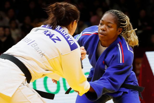 Kazakhstan's Ekaterina Tokareva (white) and France's Liz Ngelebeya compete in the women's under 78 kg bronze medal bout at the Astana Grand Slam judo tournament in Astana on May 10, 2026. (Photo by STANISLAV FILIPPOV / AFP)