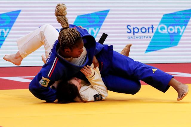 Kazakhstan's Ekaterina Tokareva (white) and France's Liz Ngelebeya compete in the women's under 78 kg bronze medal bout at the Astana Grand Slam judo tournament in Astana on May 10, 2026. (Photo by STANISLAV FILIPPOV / AFP)