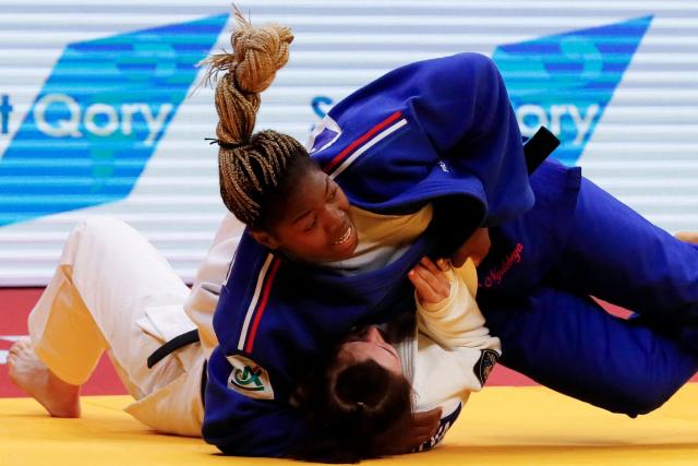 Kazakhstan's Ekaterina Tokareva (white) and France's Liz Ngelebeya compete in the women's under 78 kg bronze medal bout at the Astana Grand Slam judo tournament in Astana on May 10, 2026. (Photo by STANISLAV FILIPPOV / AFP)