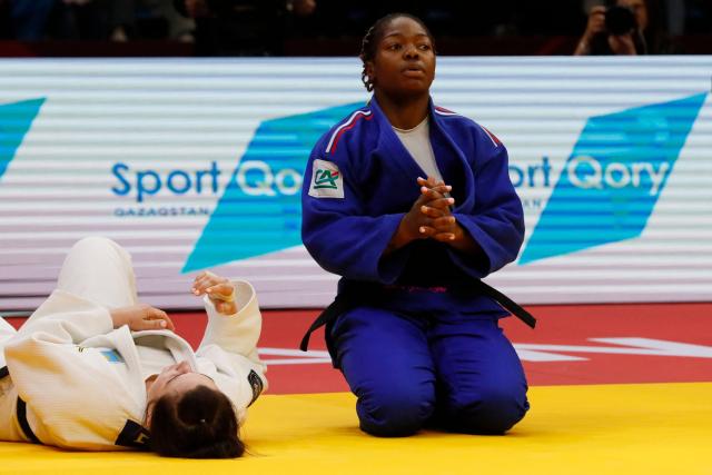 Kazakhstan's Ekaterina Tokareva (white) and France's Liz Ngelebeya compete in the women's under 78 kg bronze medal bout at the Astana Grand Slam judo tournament in Astana on May 10, 2026. (Photo by STANISLAV FILIPPOV / AFP)