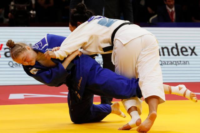 Brazil's Beatriz Freitas (white) and Canada's Coralie Godbout compete in the women's under 78 kg bronze medal bout at the Astana Grand Slam judo tournament in Astana on May 10, 2026. (Photo by STANISLAV FILIPPOV / AFP)