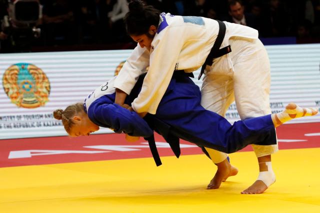 Brazil's Beatriz Freitas (white) and Canada's Coralie Godbout compete in the women's under 78 kg bronze medal bout at the Astana Grand Slam judo tournament in Astana on May 10, 2026. (Photo by STANISLAV FILIPPOV / AFP)