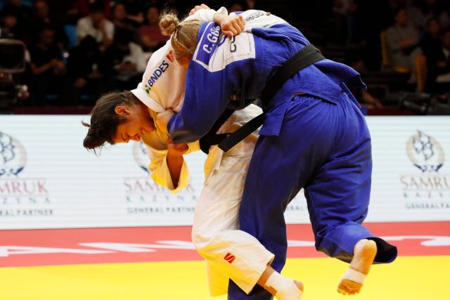 Brazil's Beatriz Freitas (white) and Canada's Coralie Godbout compete in the women's under 78 kg bronze medal bout at the Astana Grand Slam judo tournament in Astana on May 10, 2026. (Photo by STANISLAV FILIPPOV / AFP)