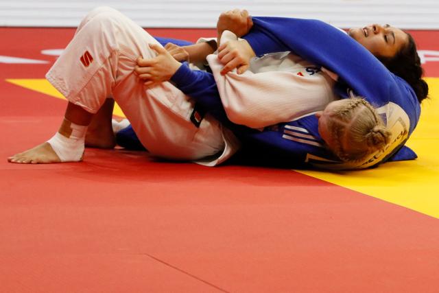 Brazil's Beatriz Freitas (white) and Canada's Coralie Godbout compete in the women's under 78 kg bronze medal bout at the Astana Grand Slam judo tournament in Astana on May 10, 2026. (Photo by STANISLAV FILIPPOV / AFP)