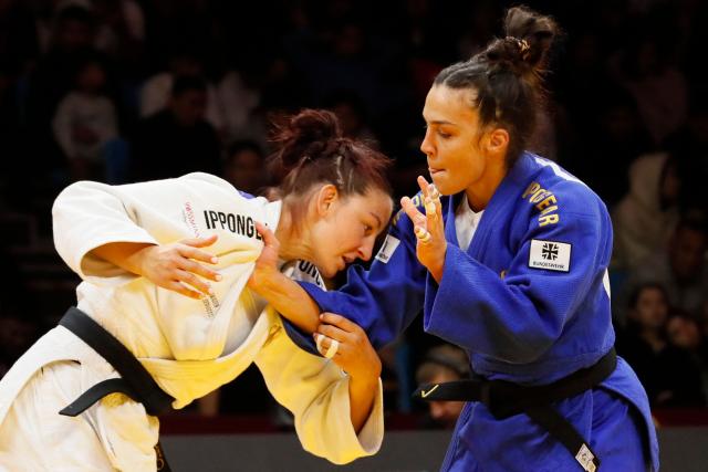 Germany's Anna Monta Olek (white) and Germany's Alina Boehm compete in the women's under 78 kg gold medal bout at the Astana Grand Slam judo tournament in Astana on May 10, 2026. (Photo by STANISLAV FILIPPOV / AFP)