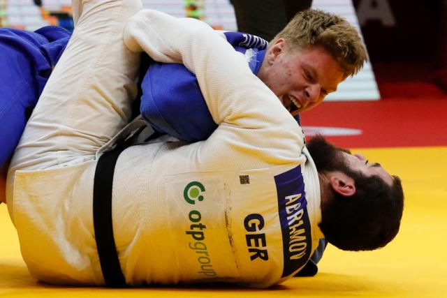 Germany's Erik Abramov (white) and Poland's Jakub Sordyl compete in the men's over 100 kg bronze medal bout at the Astana Grand Slam judo tournament in Astana on May 10, 2026. (Photo by STANISLAV FILIPPOV / AFP)