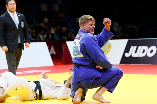 Germany's Erik Abramov (white) and Poland's Jakub Sordyl compete in the men's over 100 kg bronze medal bout at the Astana Grand Slam judo tournament in Astana on May 10, 2026. (Photo by STANISLAV FILIPPOV / AFP)
