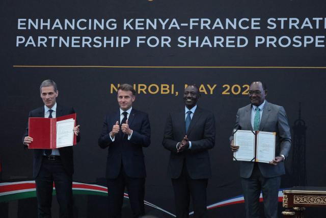 (From L) Chairman and Chief Executive Officer (CEO) of the CMA CGM Group Rodolphe Saade, France's President Emmanuel Macron, Kenya's President William Ruto and Kenya's Principal Secretary for National Treasury Chris Kiptoo pose for a photograph after signing an agreement during a reception at State House ahead of the Africa Forward: Africa- France Partnerships for Innovation and Growth Summit in Nairobi, on May 10, 2026. Kenya and France will jointly host the “Africa Forward: Africa- France Partnerships for Innovation and Growth” Summit, which will bring together African and French Heads of State and Government. (Photo by Ludovic MARIN / AFP)
