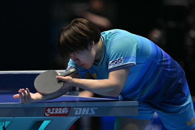 Japan's Sora Matsushima serves against China's Wang Chuqin during their Men's Teams final match at the ITTF World Table Tennis Championships in Wembley Arena, west London on May 10, 2026. (Photo by Glyn KIRK / AFP)