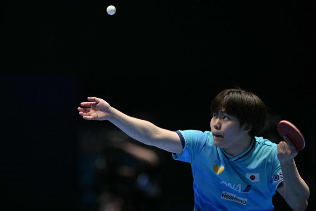 Japan's Sora Matsushima serves against China's Wang Chuqin during their Men's Teams final match at the ITTF World Table Tennis Championships in Wembley Arena, west London on May 10, 2026. (Photo by Glyn KIRK / AFP)