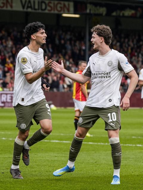 PSV Eindhoven's US forward #09 Ricardo Pepi (L) celebrates after scoring a goal with PSV Eindhoven's Austrian midfielder #10 Paul Wanner during the Dutch Eredivisie football match between Go Ahead Eagles and PSV Eindhoven at De Adelaarshorst in Deventer on May 10, 2026. (Photo by Tobias Kleuver / ANP / AFP) / Netherlands OUT