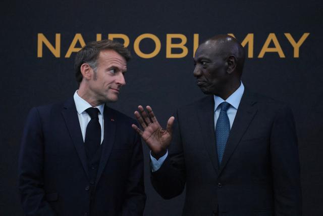 France's President Emmanuel Macron (L) speaks with Kenya's President William Ruto (R) during the signing of bilateral agreements at State House ahead of the Africa Forward: Africa- France Partnerships for Innovation and Growth Summit in Nairobi, on May 10, 2026. Kenya and France will jointly host the “Africa Forward: Africa- France Partnerships for Innovation and Growth” Summit, which will bring together African and French Heads of State and Government. (Photo by Ludovic MARIN / AFP)