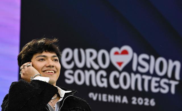 Austrian singer Johannes Pietsch aka JJ, winner of the 2025 Eurovision Song Contest (ESC) speaks at the opening ceremony of the Eurovision Song Contest 2026 at the City Hall Square in Vienna, Austria on May 10, 2026. The event is the official starting point of Eurovision week in Vienna. The city will host the two semi-finals on May 12 and May 14 and the final on May 16, 2026. (Photo by Tobias SCHWARZ / AFP)