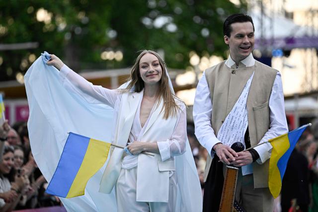 Ukrainian singer Victoria Leleka, aka Leleka and representing Ukraine with the song 'Ridnym', poses for photographers on the turquoise carpet for the opening ceremony of the Eurovision Song Contest 2026 at the City Hall Square in Vienna, Austria on May 10, 2026. The event is the official starting point of Eurovision week in Vienna. The city will host the two semi-finals on May 12 and May 14 and the final on May 16, 2026. (Photo by Tobias SCHWARZ / AFP)