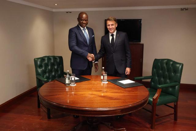 Gabon's President Brice Oligui Nguema (L) shakes hands with France's President Emmanuel Macron (R) during a bilateral meeting ahead of the Africa Forward: Africa- France Partnerships for Innovation and Growth Summit in Nairobi, on May 10, 2026. Kenya and France will jointly host the “Africa Forward: Africa- France Partnerships for Innovation and Growth” Summit, which will bring together African and French Heads of State and Government. (Photo by Ludovic MARIN / AFP)