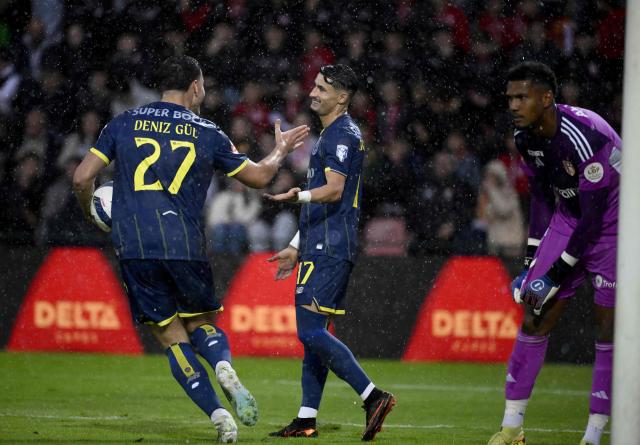 FC Porto's Turkish forward #27 Deniz Gul celebrates with FC Porto's Spanish forward #17 Borja Sainz scoring his team's first goal during the Portuguese League football match between AVS Futebol SAD and FC Porto at at CD Aves stadium in Vila das Aves on May 10, 2026. (Photo by Miguel RIOPA / AFP)