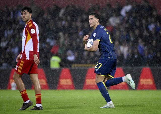 FC Porto's Turkish forward #27 Deniz Gul celebrates scoring his team's first goal during the Portuguese League football match between AVS Futebol SAD and FC Porto at at CD Aves stadium in Vila das Aves on May 10, 2026. (Photo by Miguel RIOPA / AFP)