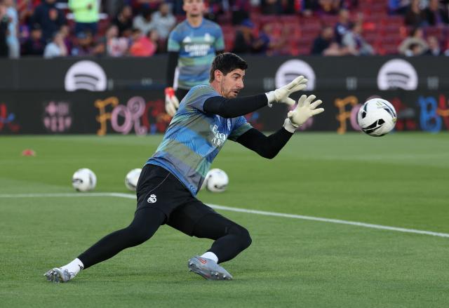 Real Madrid's Belgian goalkeeper #01 Thibaut Courtois warms up prior the Spanish league football match between FC Barcelona and Real Madrid CF at Camp Nou Stadium in Barcelona on May 10, 2026. (Photo by Lluis GENE / AFP)