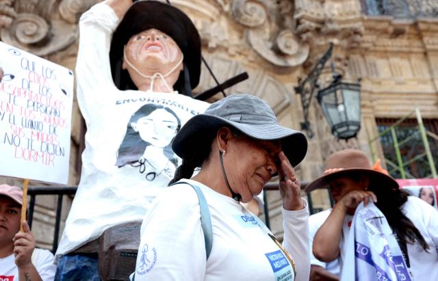 A mother searching for her missing child cries after speaking during a protest on Mother's Day in Guadalajara, Jalisco, Mexico, on May 10, 2026. (Photo by ULISES RUIZ / AFP)