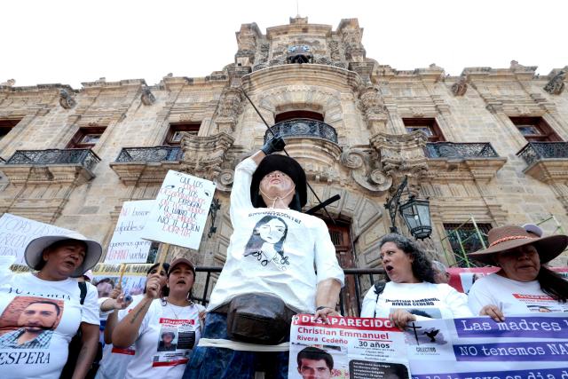 Mothers searching for their missing children from various collectives shout slogans during a protest on Mother's Day in Guadalajara, Jalisco state, Mexico, on May 10, 2026. (Photo by ULISES RUIZ / AFP)