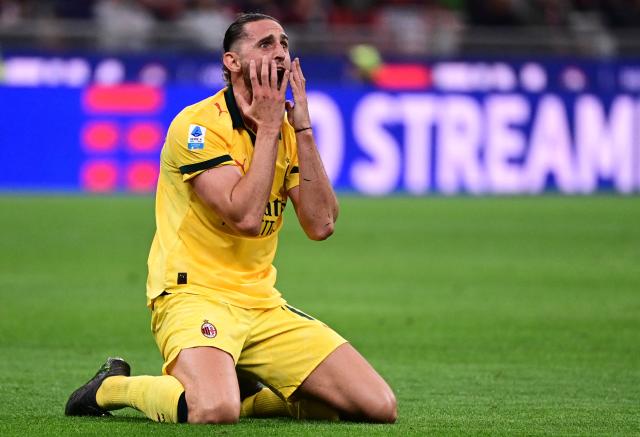AC Milan's French midfielder #12 Adrien Rabiot reacts during the Italian Serie A football match between AC Milan and Atalanta Bergamo at San Siro Stadium in Milan on May 10, 2026. (Photo by Piero CRUCIATTI / AFP)