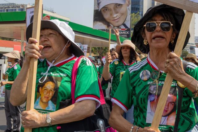 Mothers, relatives and search collectives for missing persons take part in the "XIV Marcha de la Dignidad Nacional: Madres Buscando a sus Hijos, Hijas, Verdad y Justicia" (14th National March for Dignity, Mothers Searching for their Sons and Daughters, Truth and Justice) on Mother's Day, in Mexico City, on May 10, 2026. (Photo by Gerardo Magallon / AFP)