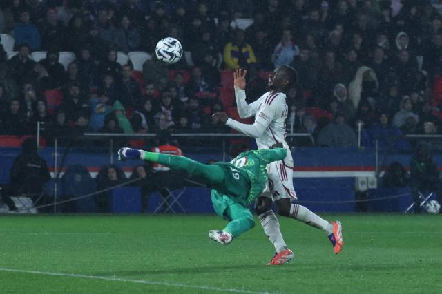 Paris Saint-Germain's Italian goalkeeper #89 Renato Marin makes a save on front of Brest's Malian midfielder #23 Kamory Doumbia during the French L1 football match between Paris Saint-Germain (PSG) and Stade Brestois 29 (Brest) at the Parc des Princes stadium in Paris on May 10, 2026. (Photo by Xavier GALIANA / AFP)