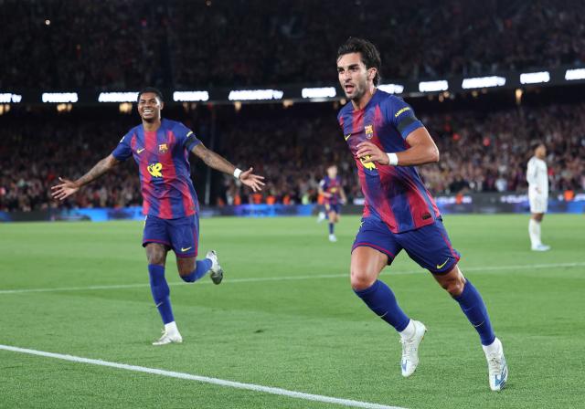 Barcelona's Spanish forward #07 Ferran Torres (R) celebrates scoring his team's second goal with Barcelona's English forward #14 Marcus Rashford during the Spanish league football match between FC Barcelona and Real Madrid CF at Camp Nou Stadium in Barcelona on May 10, 2026. (Photo by Josep LAGO / AFP)