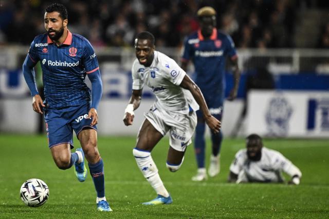 Nice's Tunisian defender #02 Ali Abdi (L) controls the ball during the French L1 football match between AJ Auxerre and OGC Nice at the Stade de l'Abbe-Deschamps in Auxerre, central France on May 10, 2026. (Photo by JEFF PACHOUD / AFP)