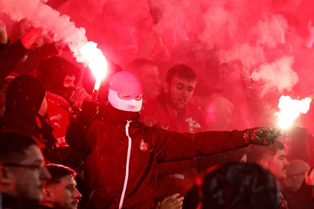A Rennes Ultras supporter lights smoke bomb during the French L1 football match between Stade Rennais FC and Paris FC at the Roazhon Park stadium in Rennes, western France on May 10, 2026. (Photo by SIMON WOHLFAHRT / AFP)